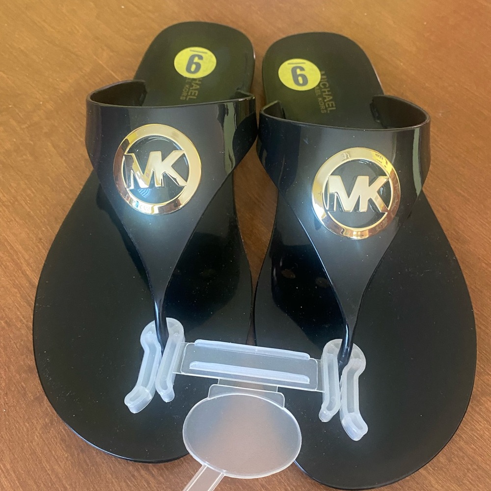 Michael Kors flips flops NWT size 9